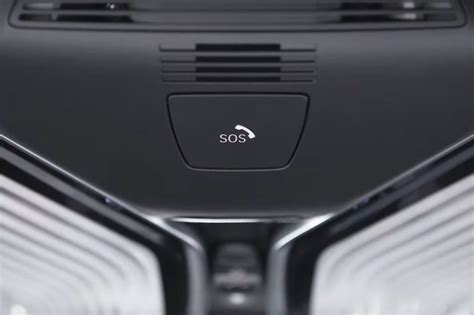 What does SOS button in BMW do?