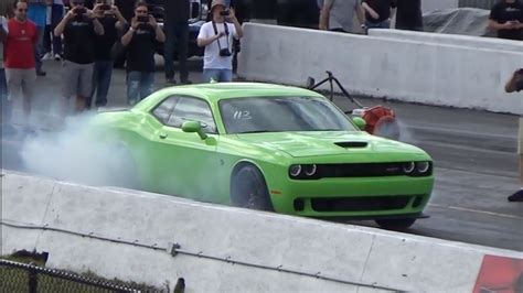 Can A Hellcat Outrun A Tesla?