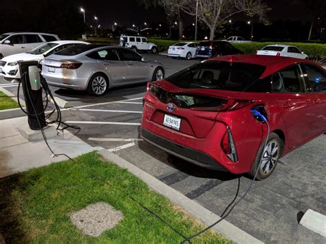 Can a Prius Prime charge at a Tesla station?