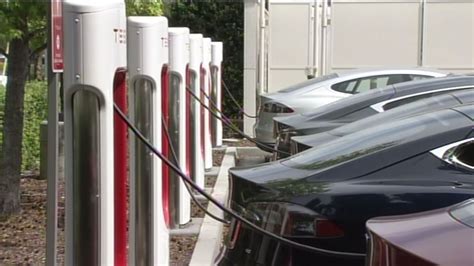 Can I charge my electric car at a Tesla station?