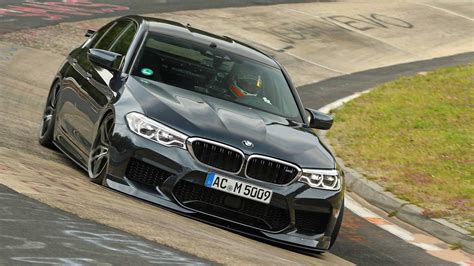 Is a BMW M5 faster than a Mustang?