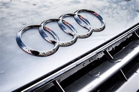 What do the 4 rings in Audi mean?