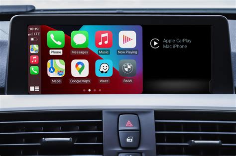 What is the difference between Apple CarPlay and BMW iDrive?