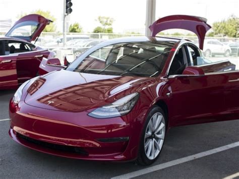 Why is Tesla no longer eligible for tax credit?