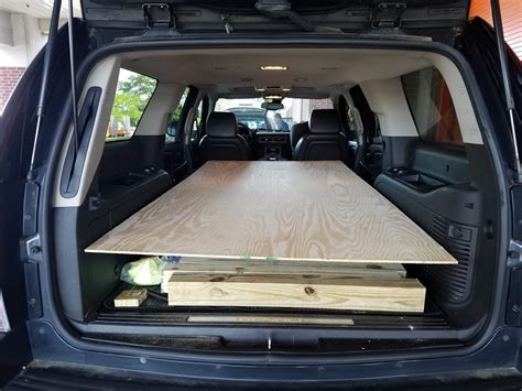 Can a sheet of plywood fit in a Suburban?