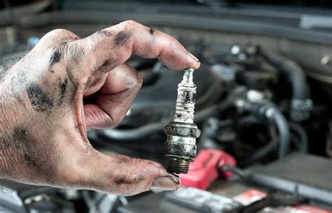 Can spark plugs cause ticking?