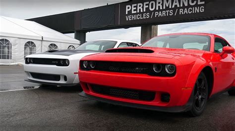 Is a hellcat faster then a demon?